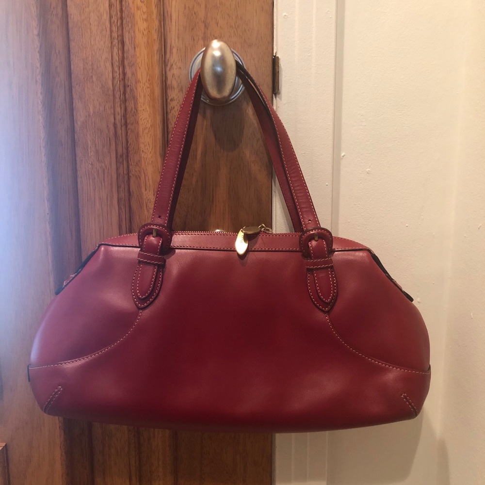 Women’s Cole Haan zipper Leather adjustable handles
